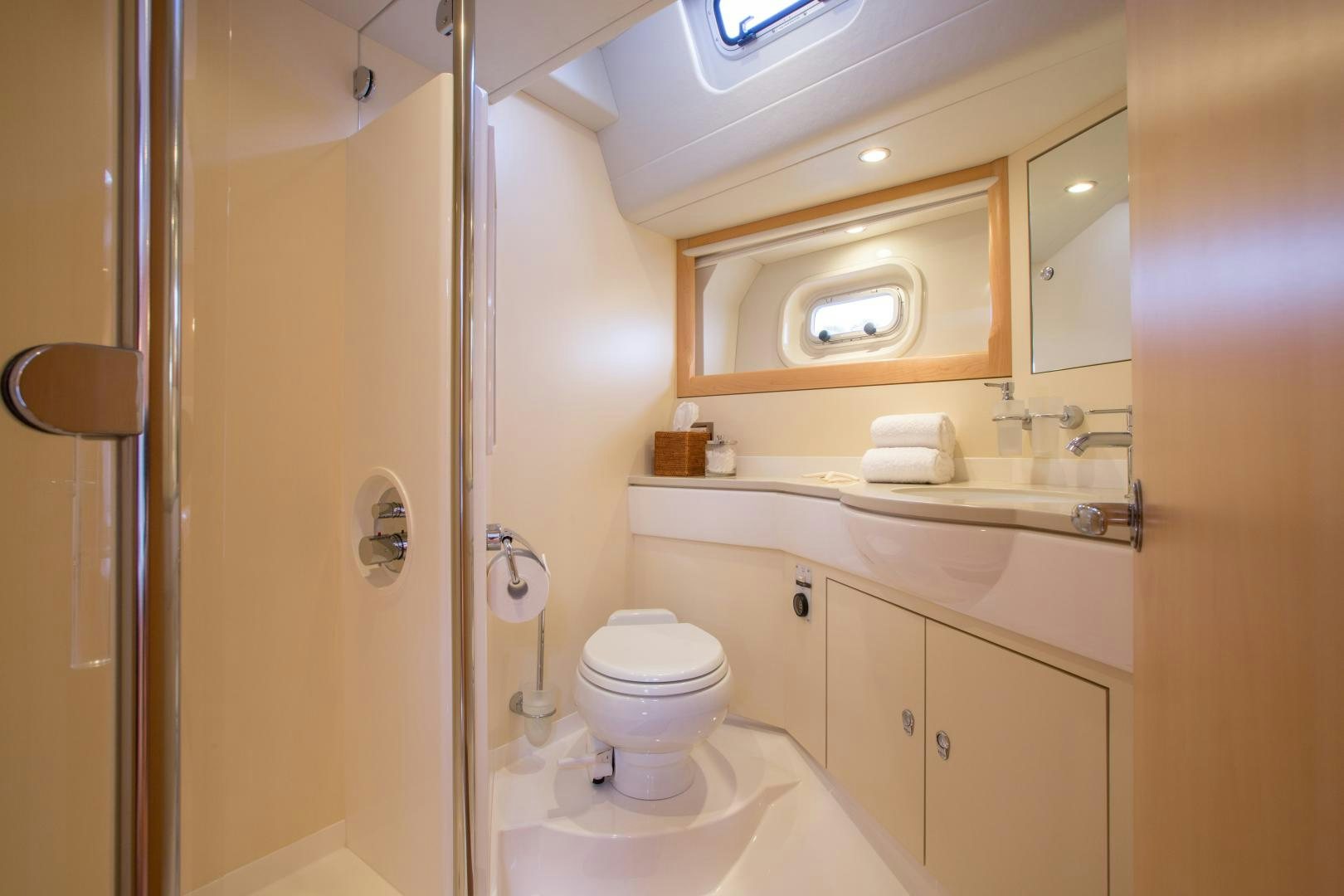 a bathroom with a toilet and sink aboard MATHILDA SOUND Yacht for Sale