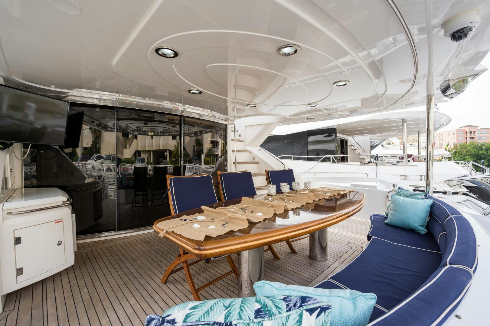 a boat with tables and chairs aboard SS ARTS Yacht for Sale