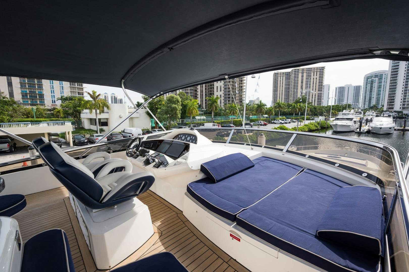 a view of a boat deck with many boats parked on it aboard SS ARTS Yacht for Sale