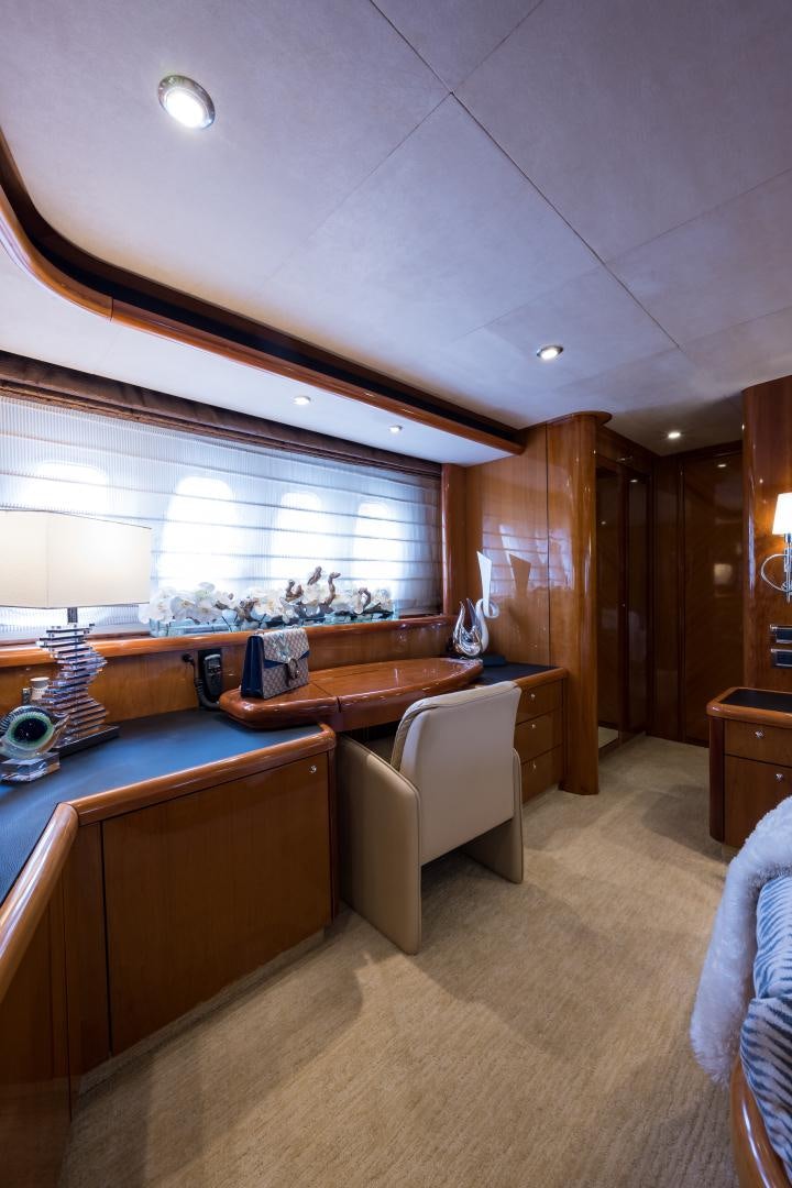 a room with a desk and a window aboard SS ARTS Yacht for Sale