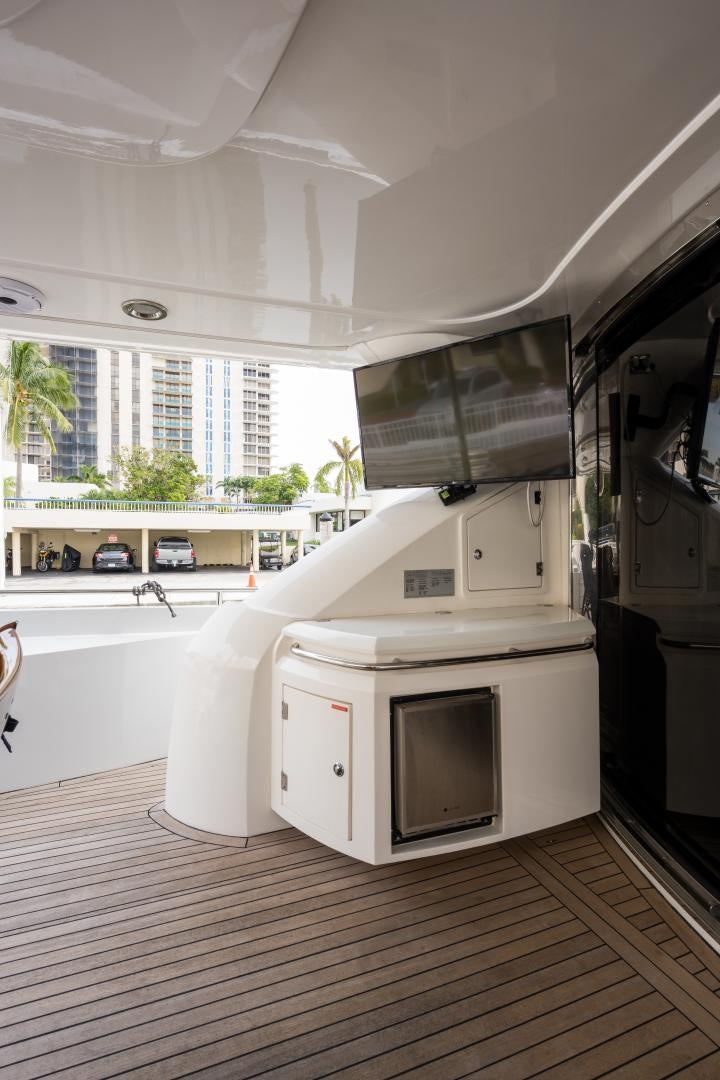 a kitchen with white appliances aboard SS ARTS Yacht for Sale