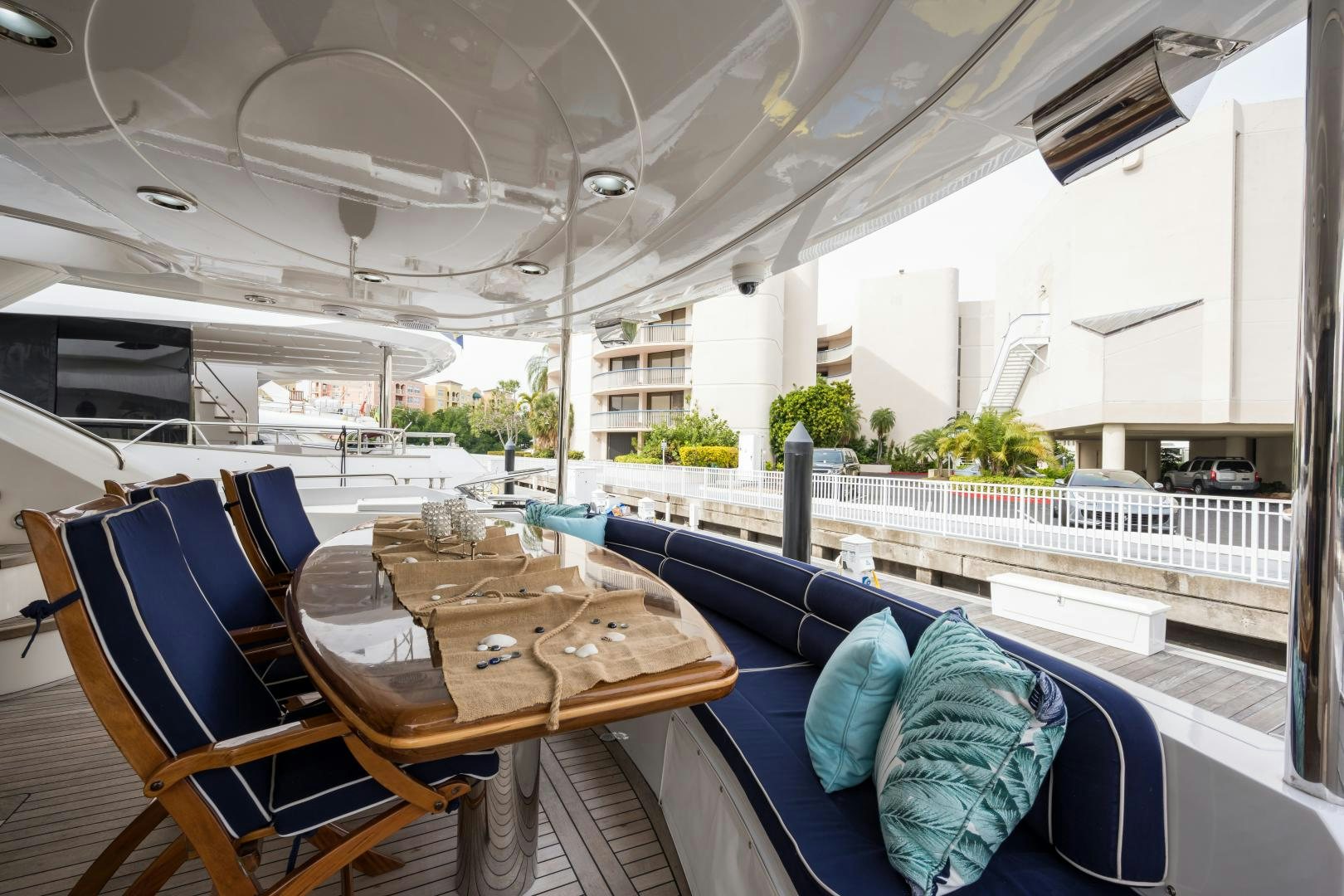 a table with chairs and a large white tent aboard SS ARTS Yacht for Sale