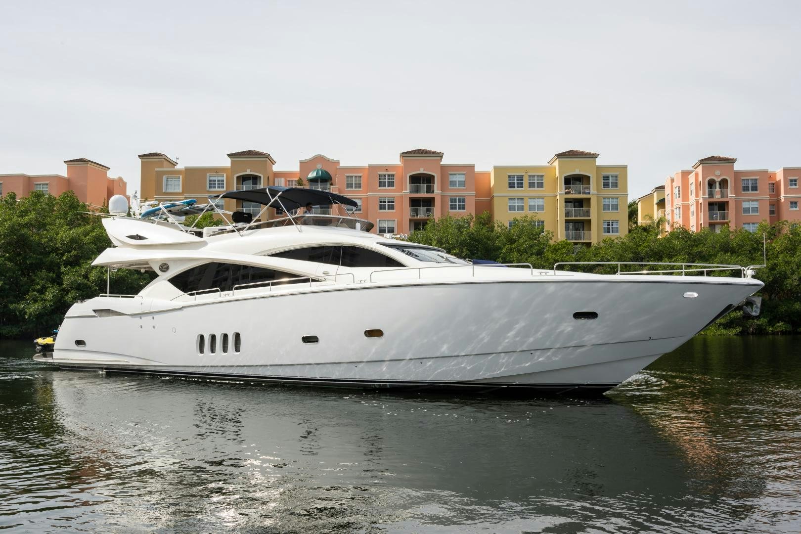 a white boat on water aboard SS ARTS Yacht for Sale