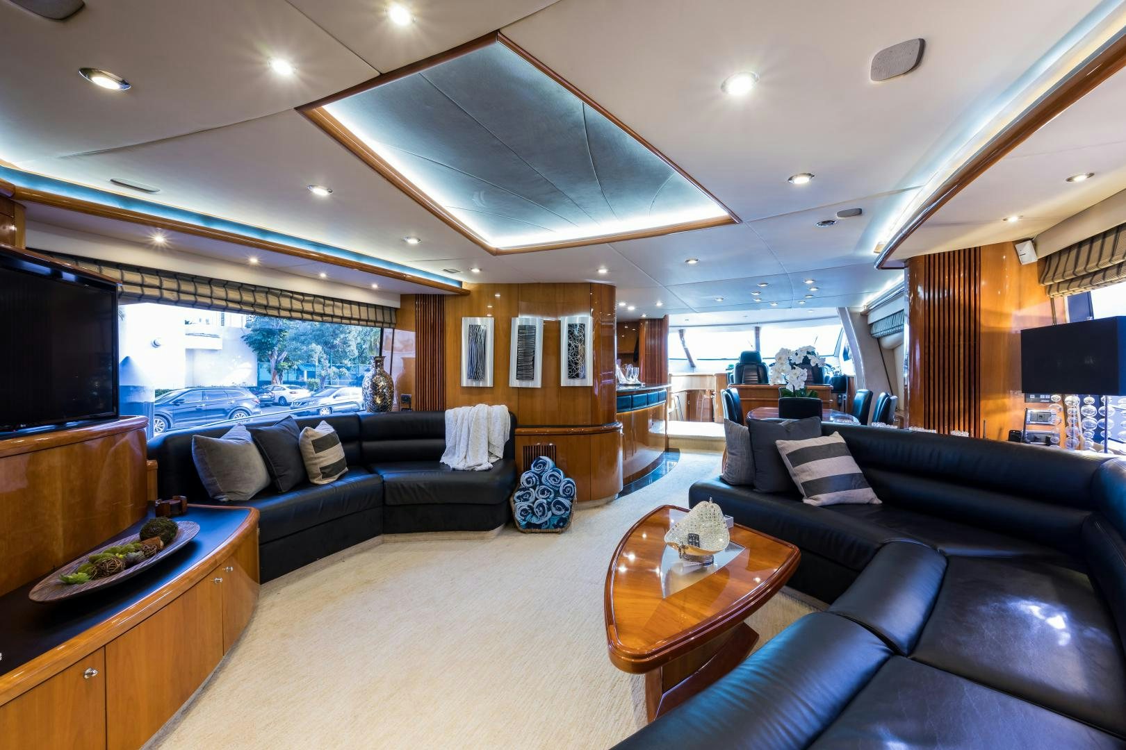 a living room with a large window aboard SS ARTS Yacht for Sale