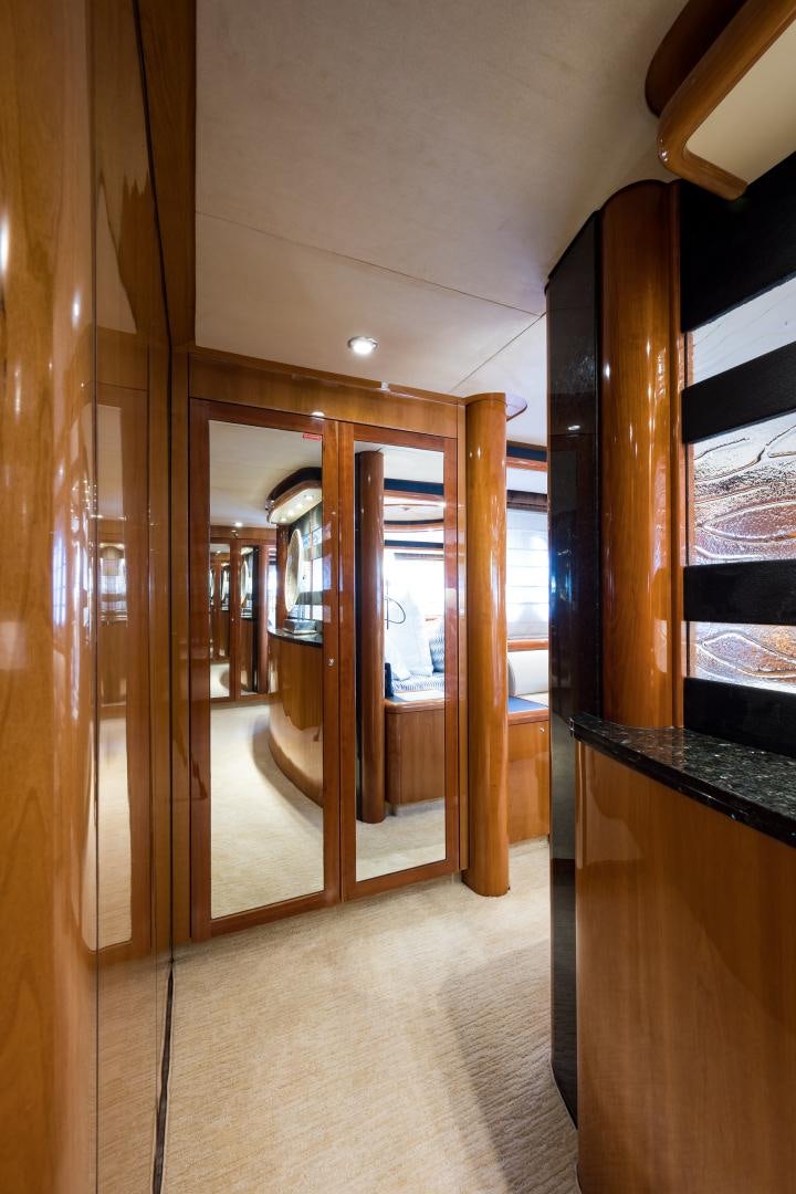 a hallway with wood walls aboard SS ARTS Yacht for Sale