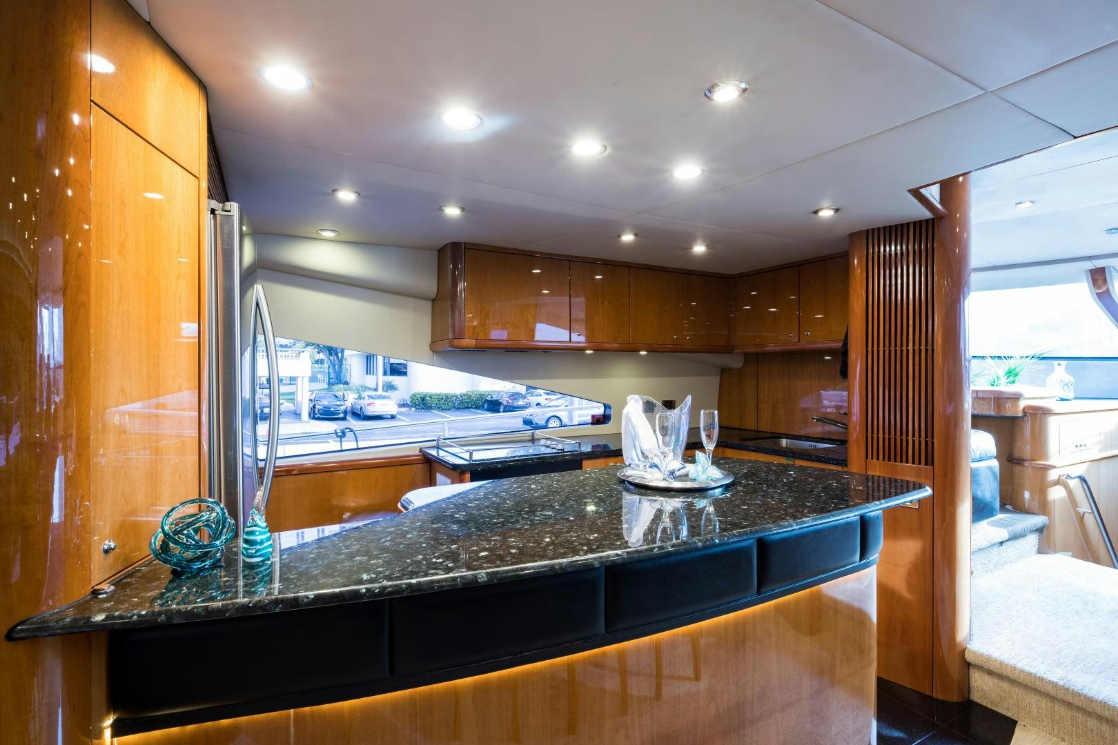 a kitchen with a large island aboard SS ARTS Yacht for Sale