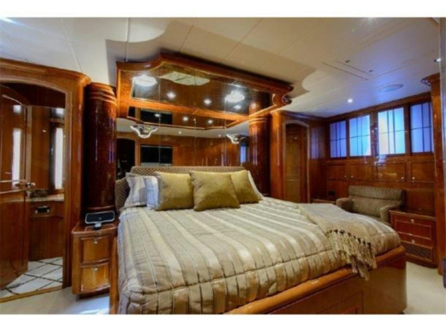a bed in a room aboard PRIMETIME Yacht for Sale