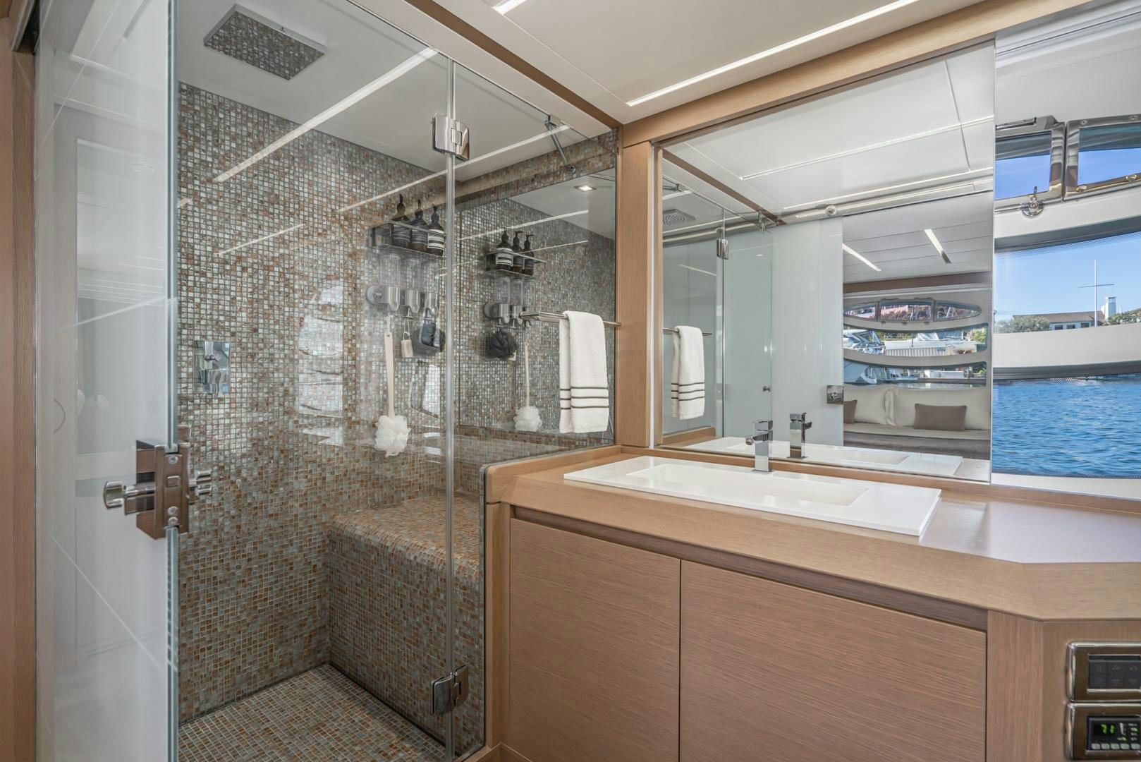a bathroom with a glass shower aboard NO NAME Yacht for Sale