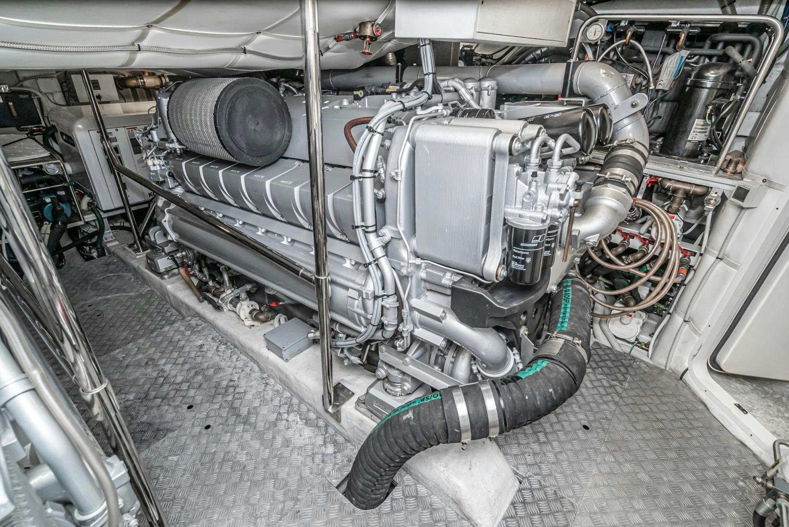 a car engine with a few pipes aboard NO NAME Yacht for Sale