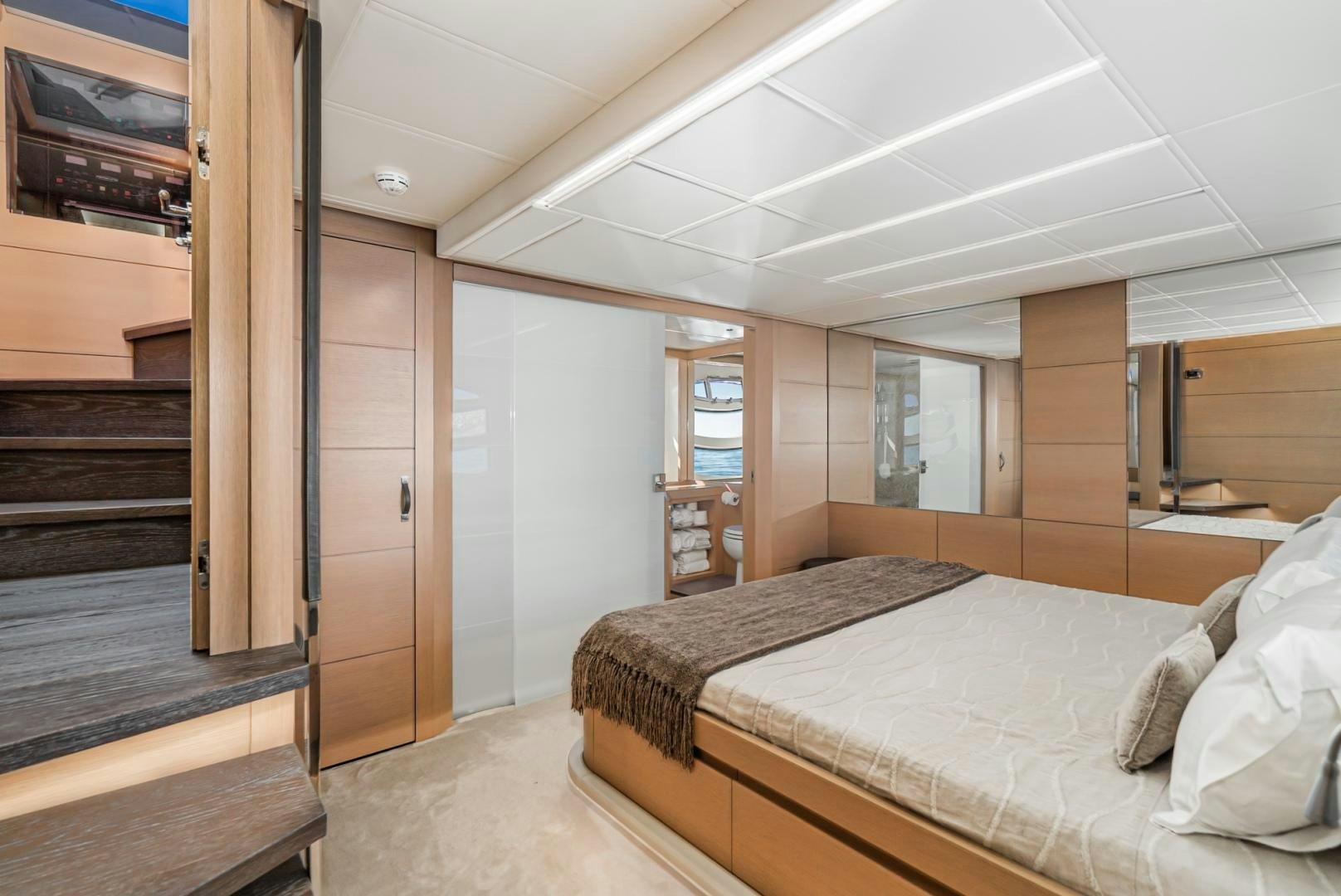 a bedroom with a bed and a television aboard NO NAME Yacht for Sale