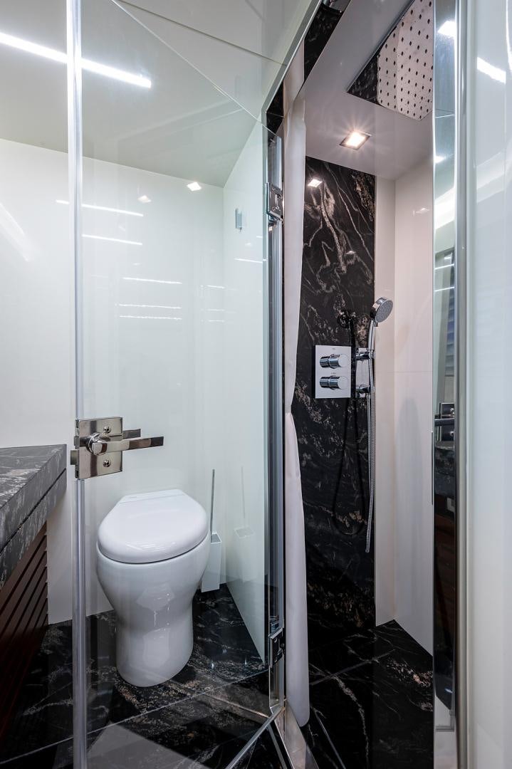 a bathroom with a toilet aboard No Name Yacht for Sale