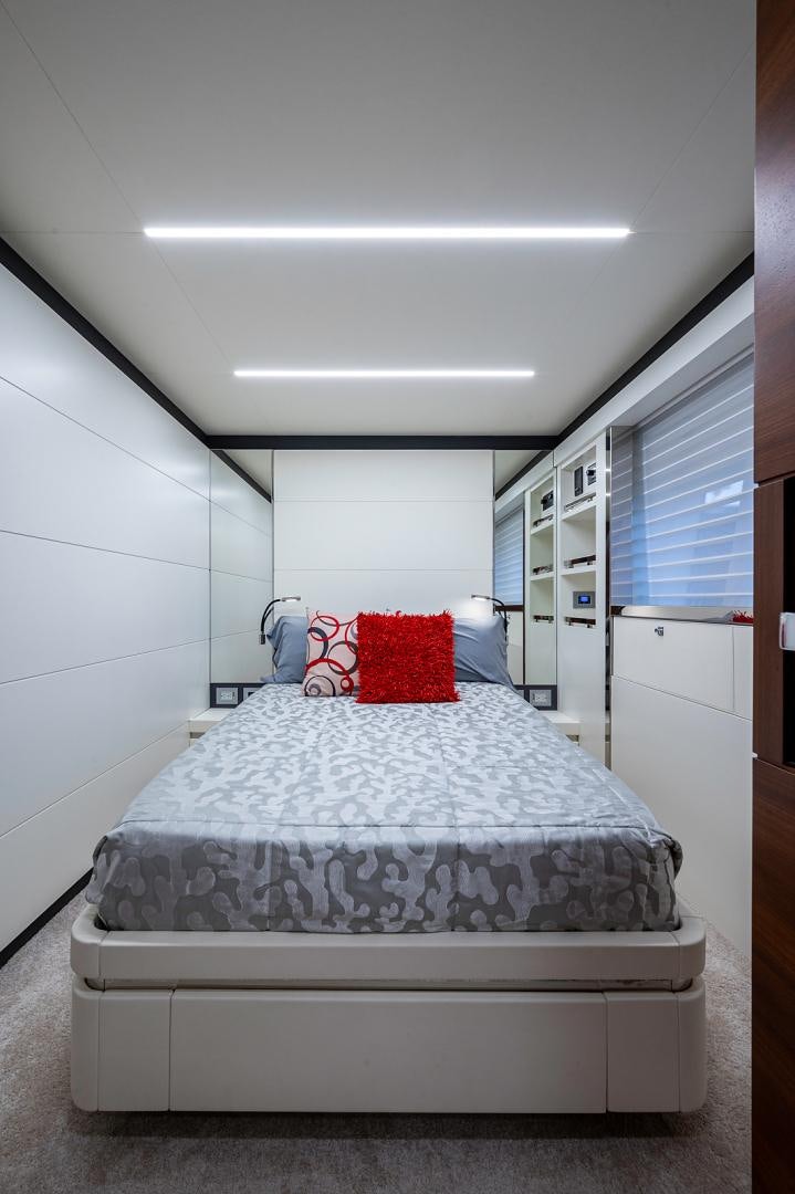 a bed in a room aboard No Name Yacht for Sale