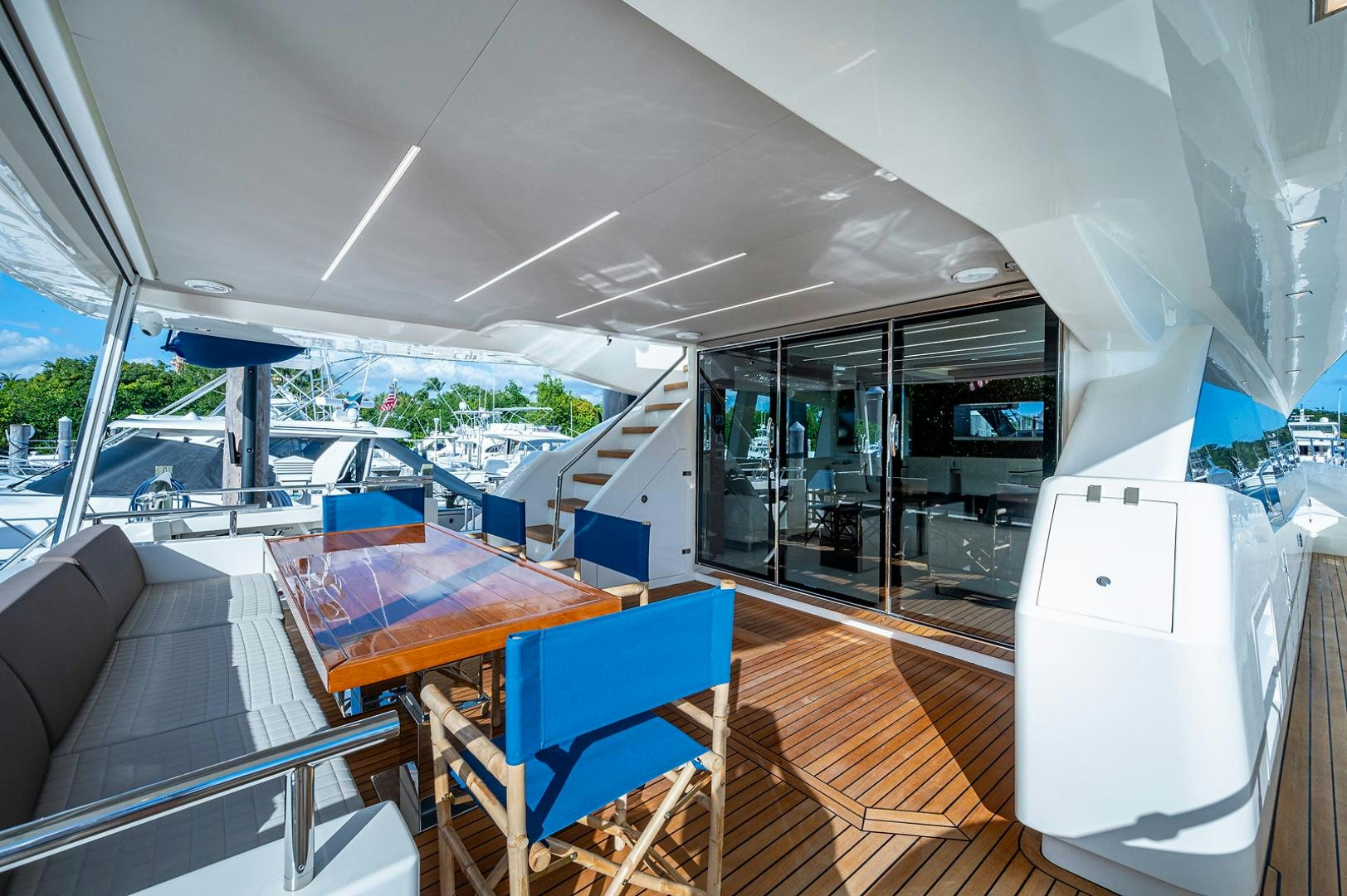 a room with a table and chairs aboard No Name Yacht for Sale