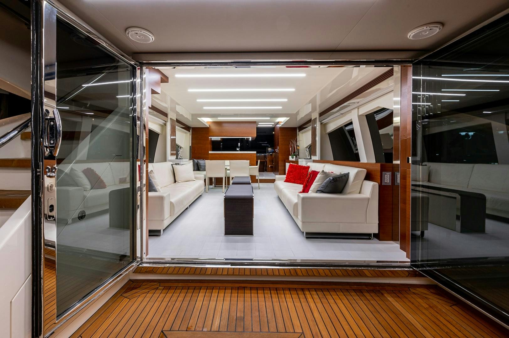a room with a couch and a table aboard No Name Yacht for Sale