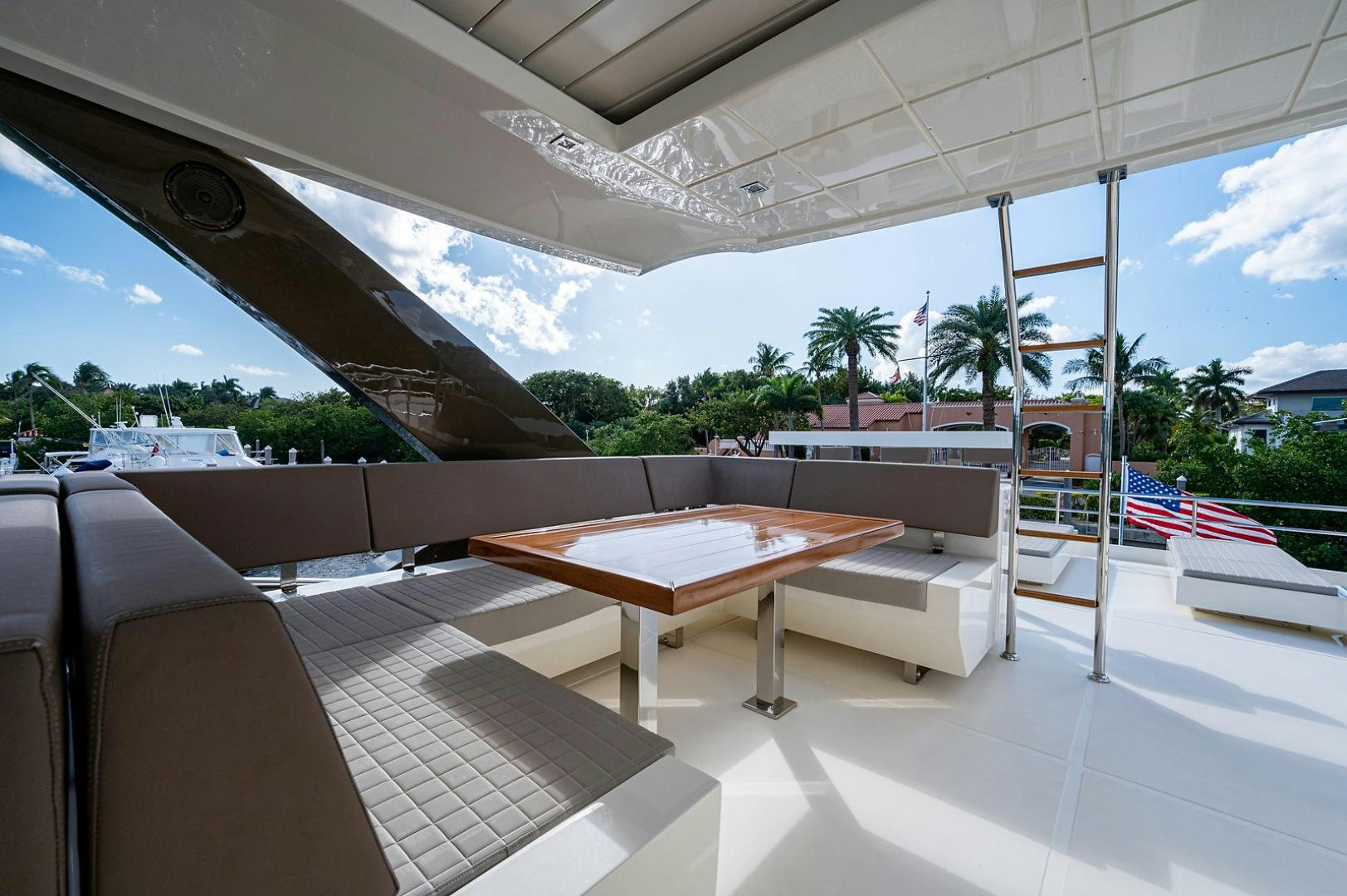a room with a table and chairs aboard No Name Yacht for Sale
