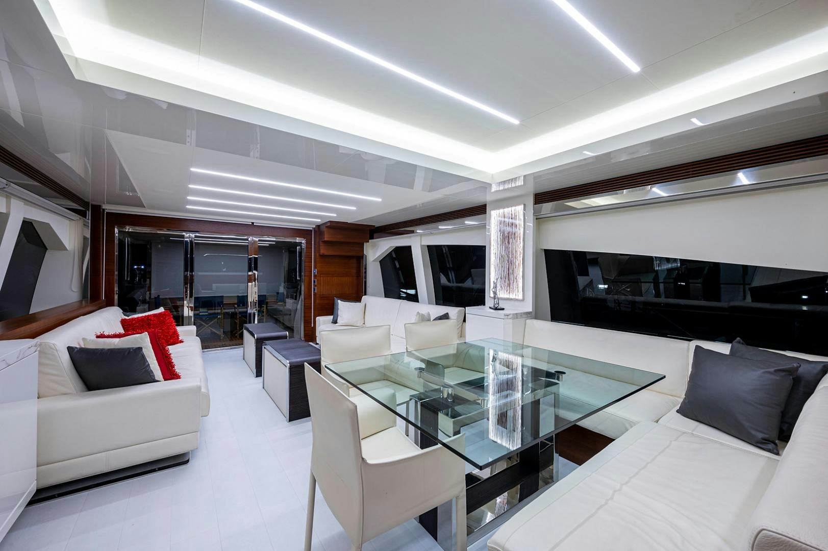 a room with a table and chairs aboard No Name Yacht for Sale