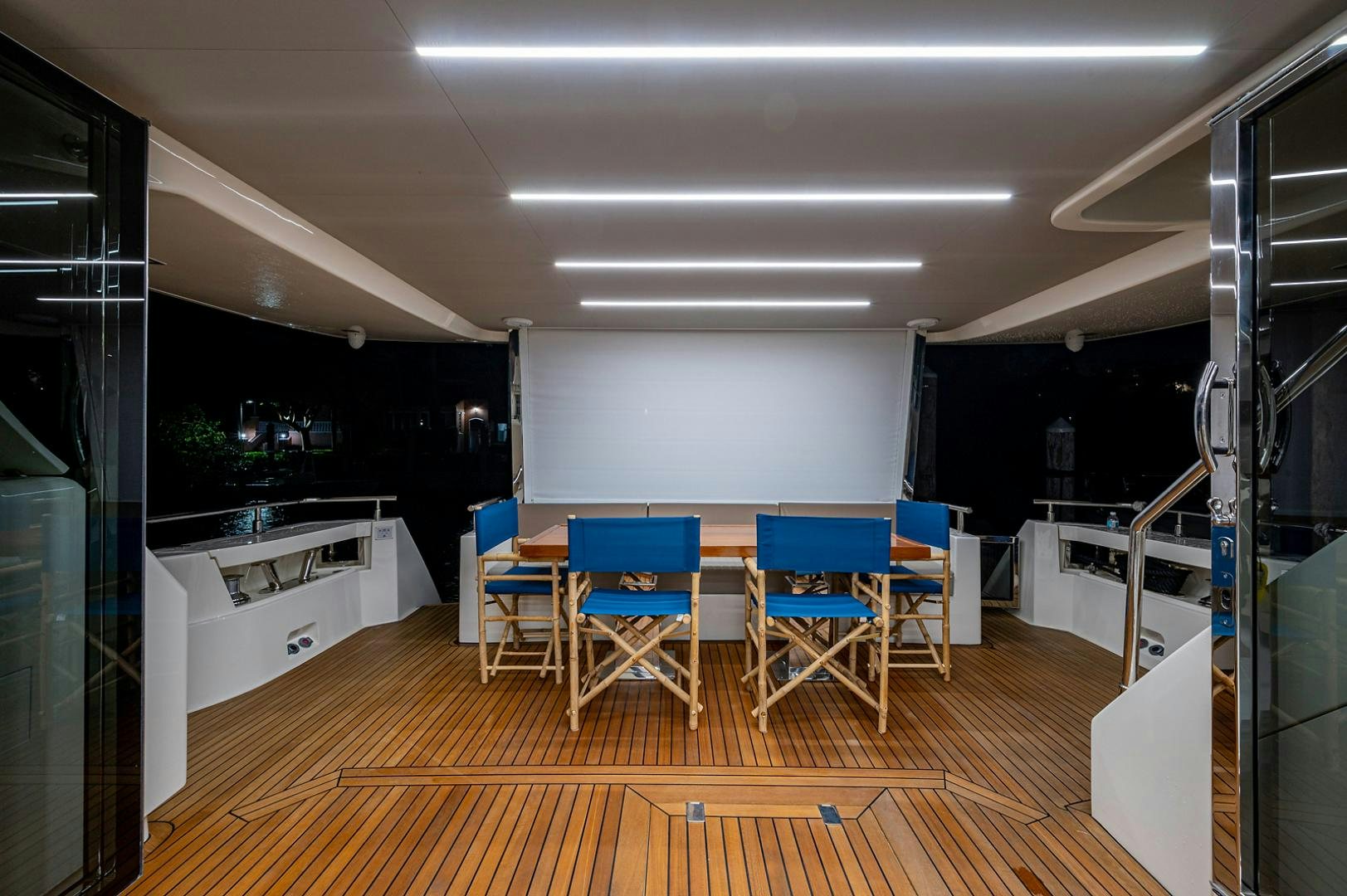 a room with chairs and a table aboard No Name Yacht for Sale