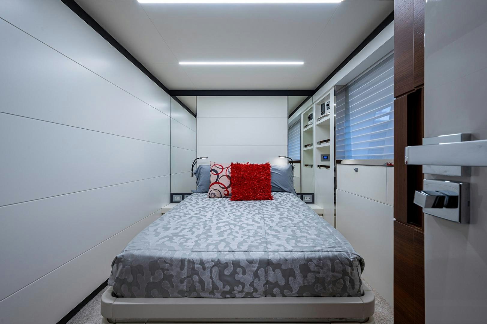 a bed in a room aboard No Name Yacht for Sale