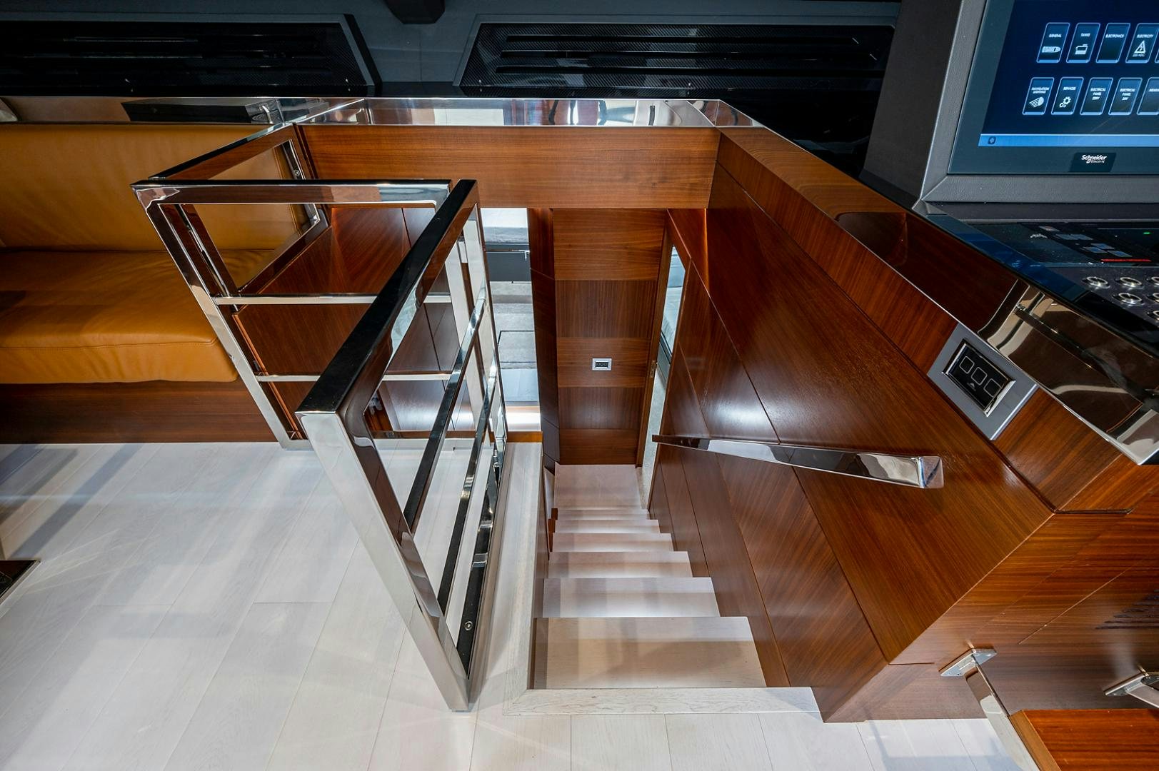 a wooden staircase in a building aboard No Name Yacht for Sale