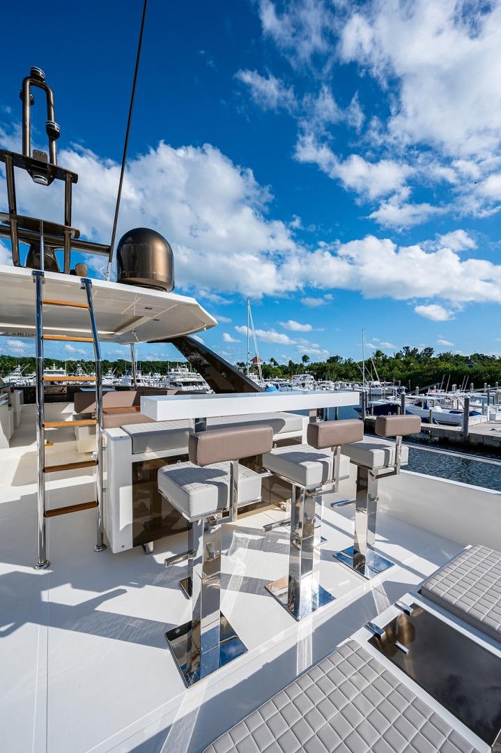 a deck with a large white building and a dome on it aboard No Name Yacht for Sale