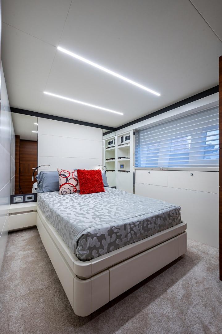 a bed in a room aboard No Name Yacht for Sale