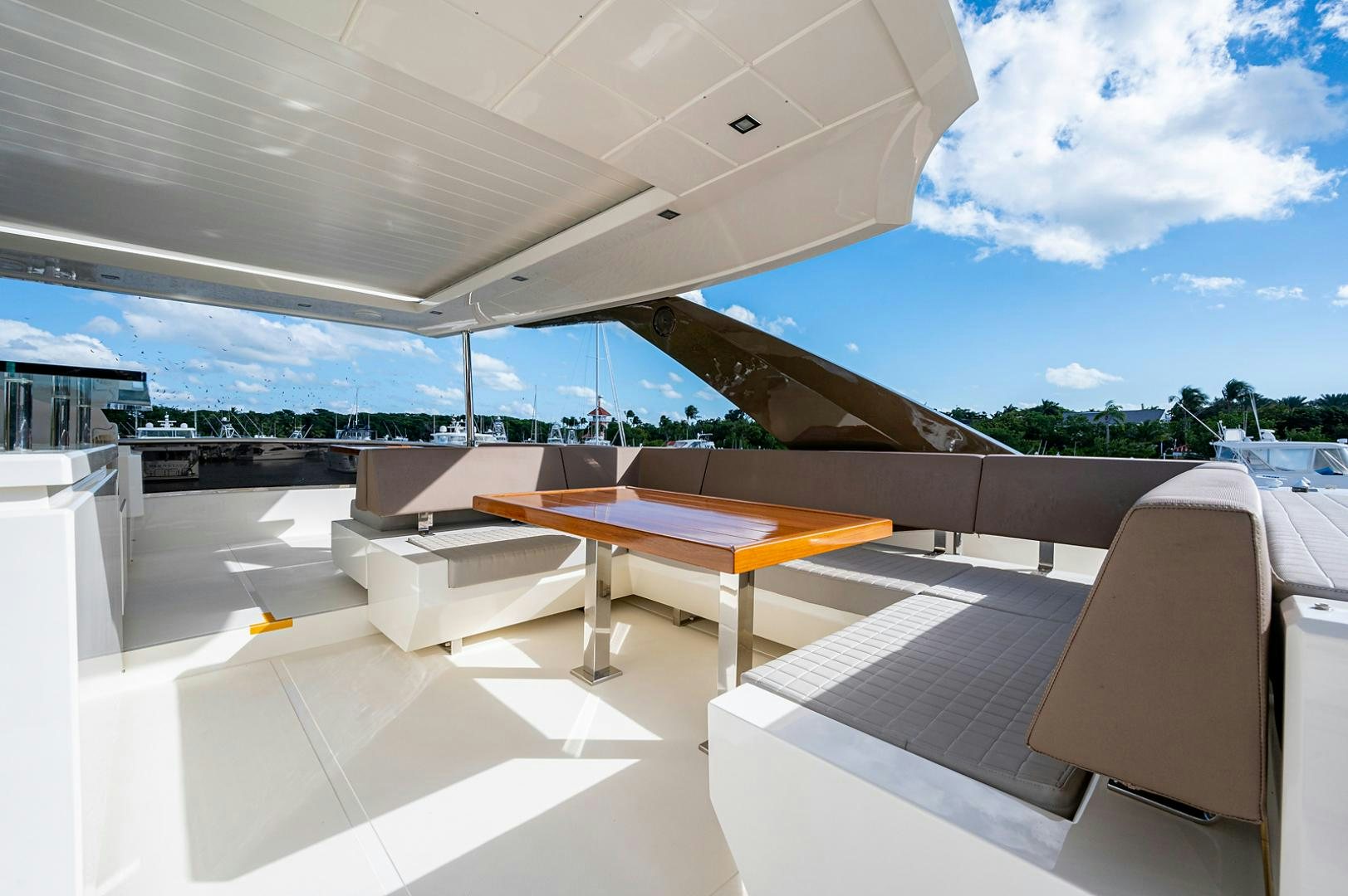 a room with a table and chairs aboard No Name Yacht for Sale