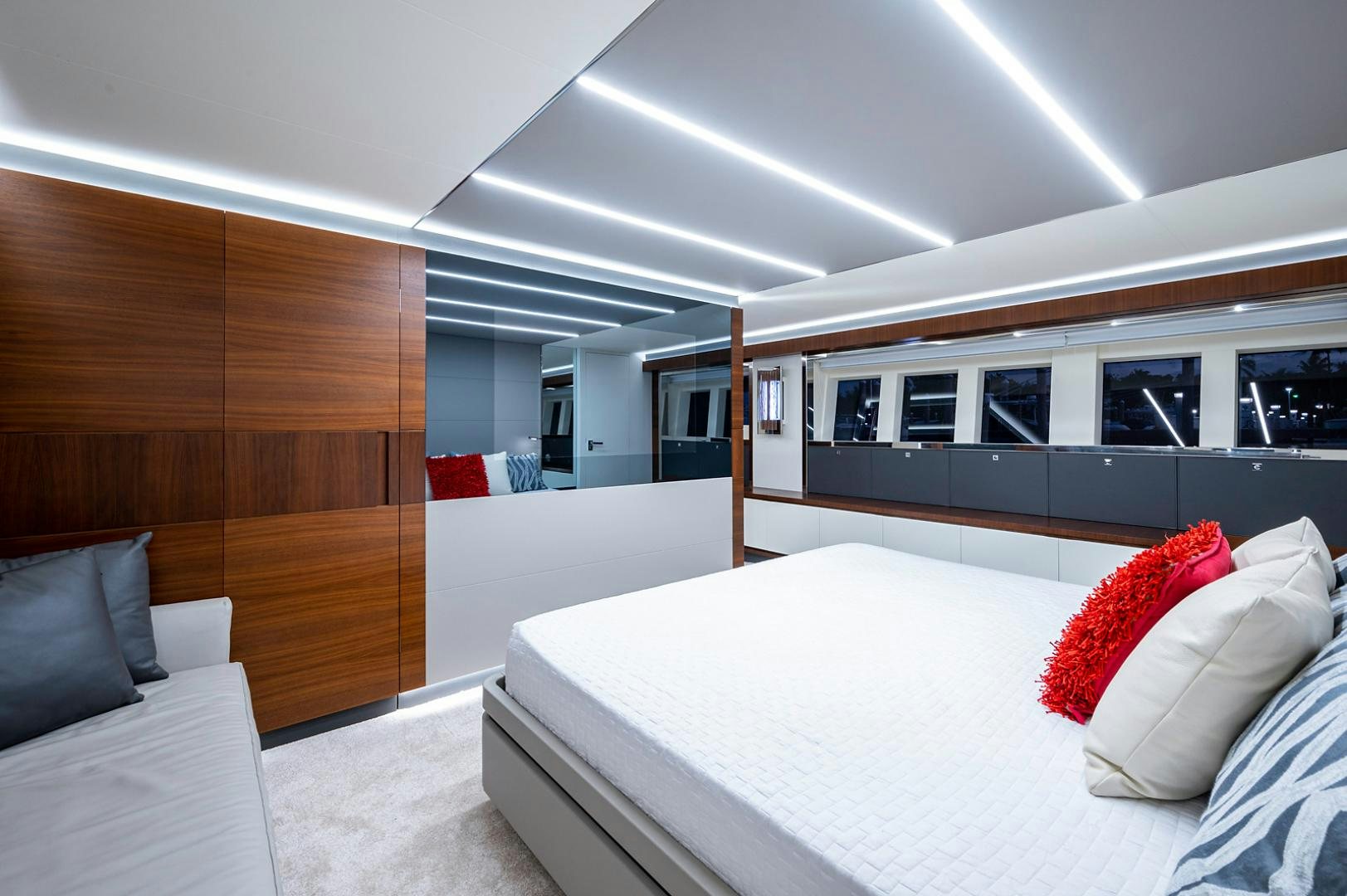 a room with a bed and a couch aboard No Name Yacht for Sale
