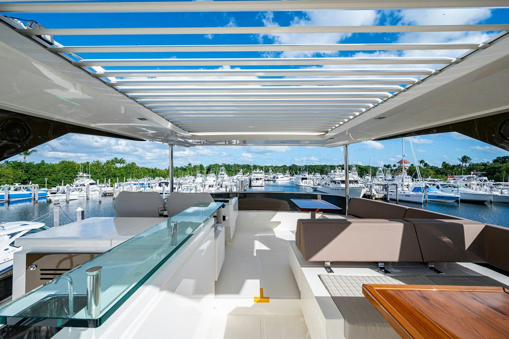 a large building with a parking lot aboard No Name Yacht for Sale