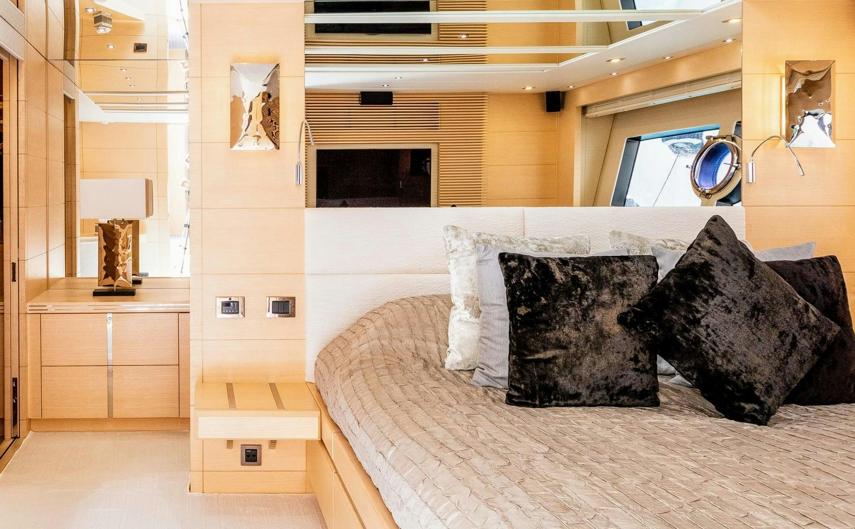 a bed with pillows aboard SKYFALL Yacht for Sale