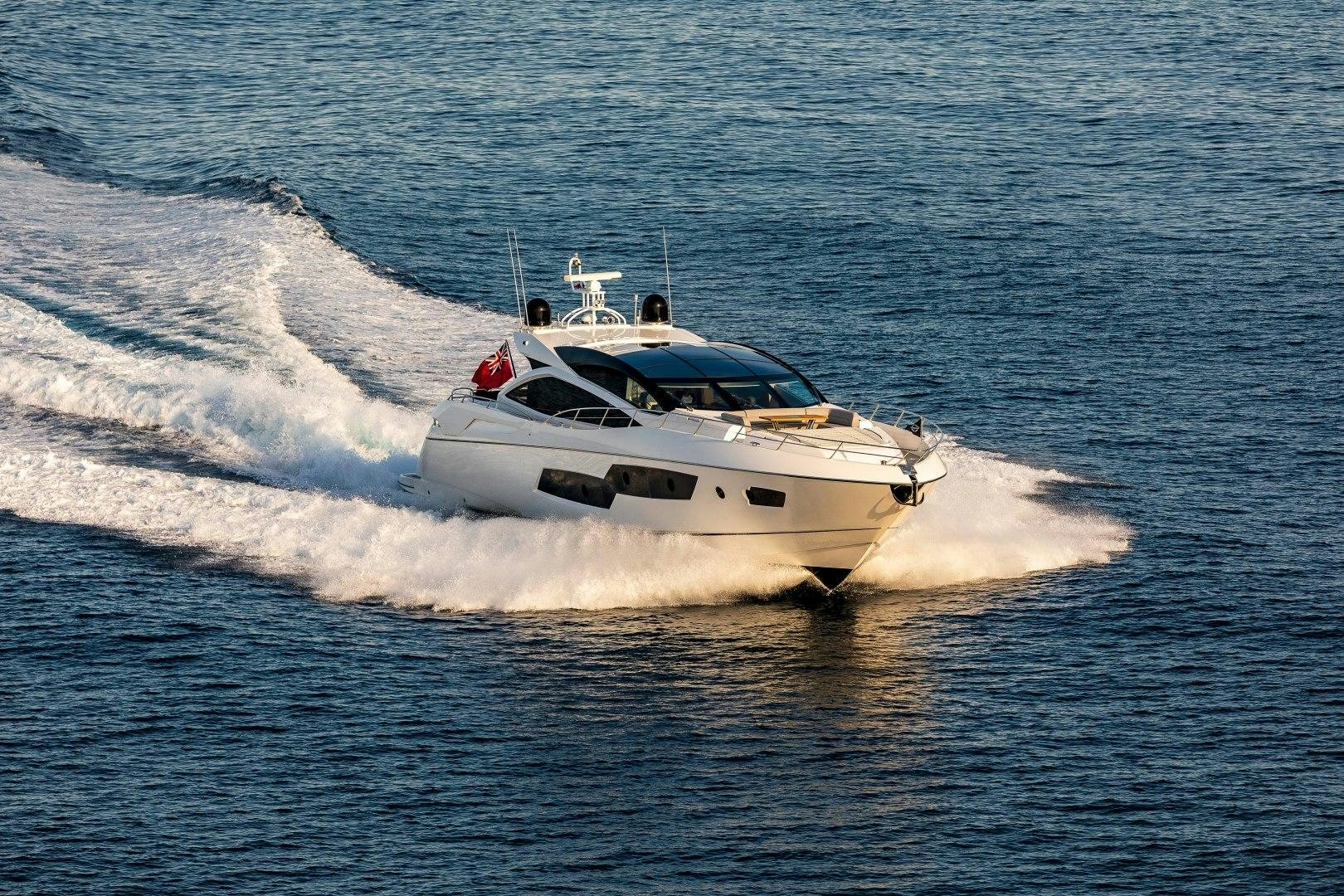 a white boat on the water aboard SKYFALL Yacht for Sale