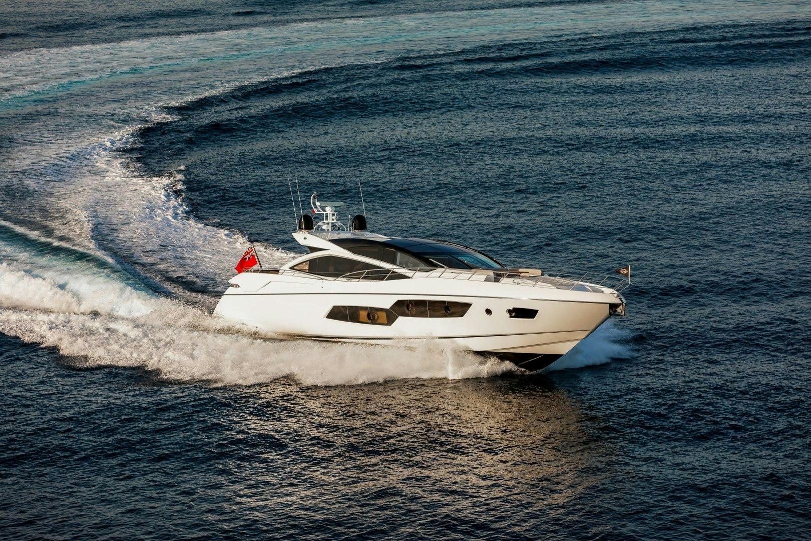 a white boat in the water aboard SKYFALL Yacht for Sale
