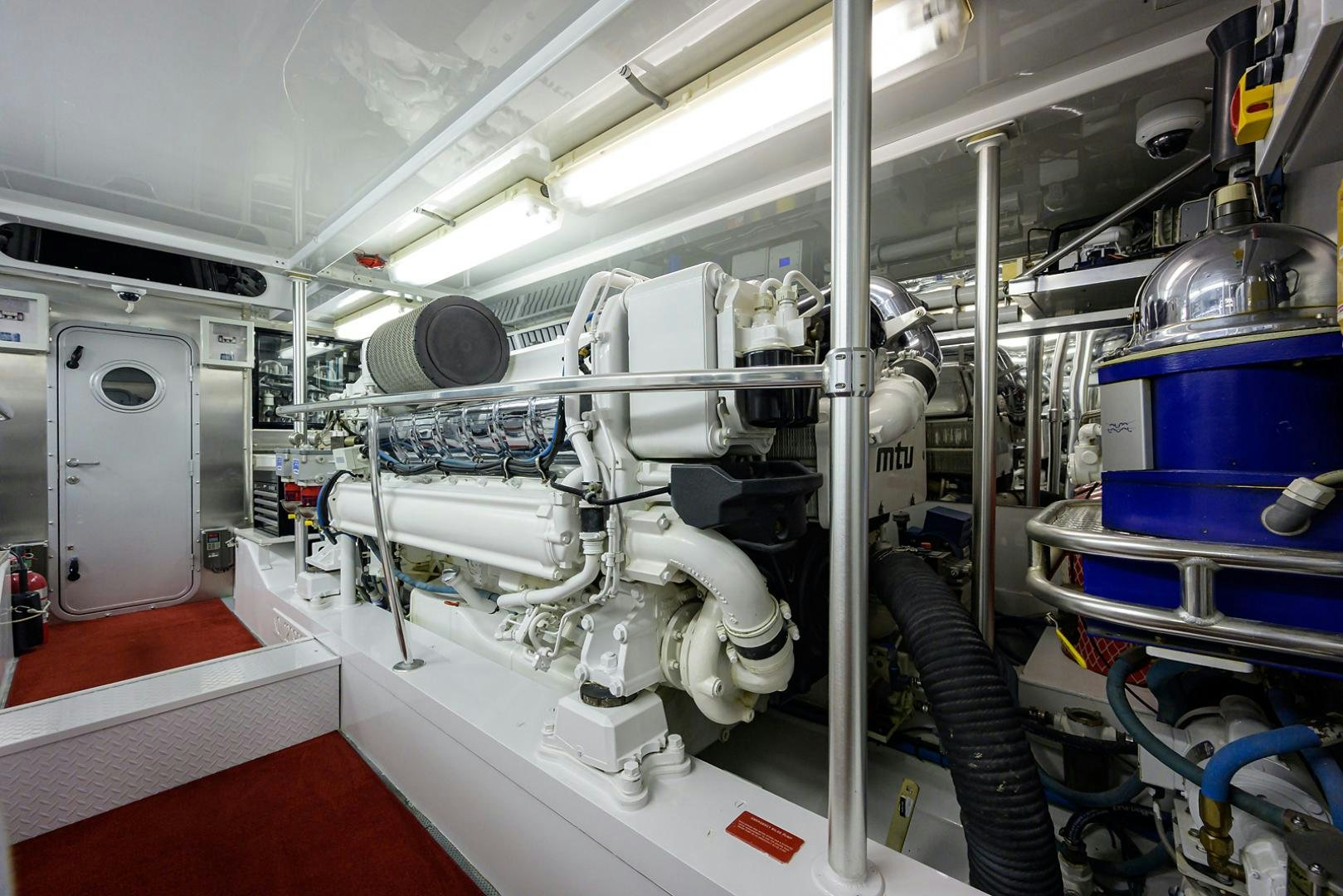 a large machine in a room aboard BLACK SHADOW Yacht for Sale