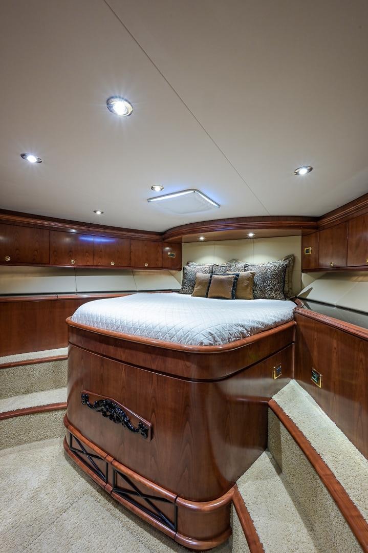 a bed in a room aboard BLACK SHADOW Yacht for Sale