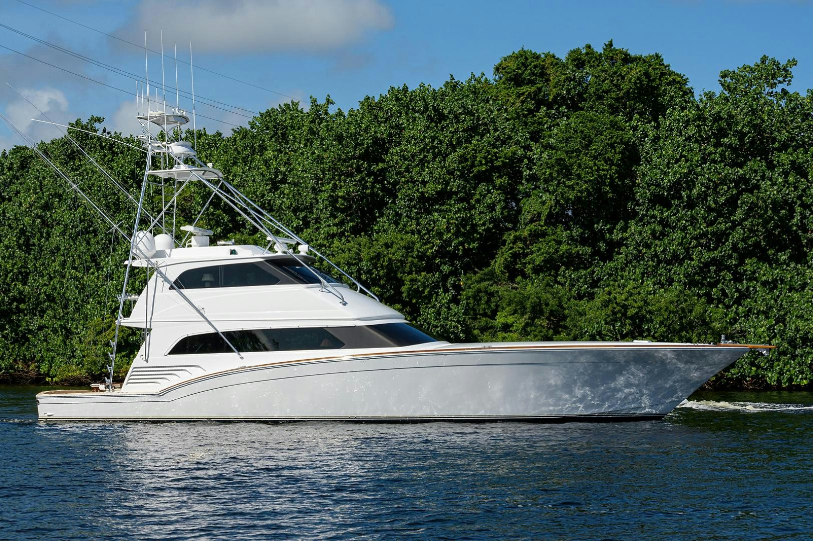 a white boat on the water aboard BLACK SHADOW Yacht for Sale