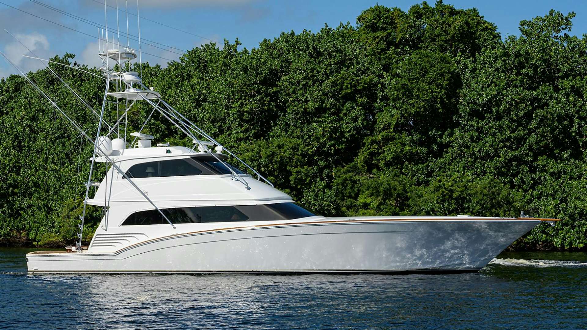 a white boat on the water aboard BLACK SHADOW Yacht for Sale