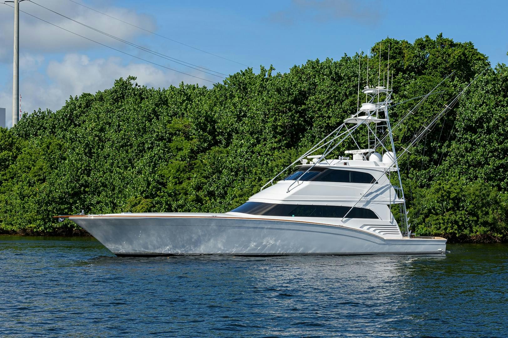 a white boat on water aboard BLACK SHADOW Yacht for Sale