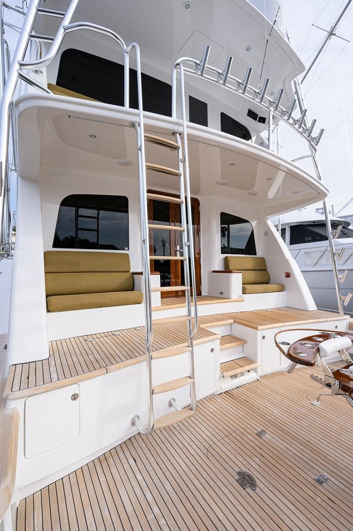 a white house with a staircase aboard BLACK SHADOW Yacht for Sale