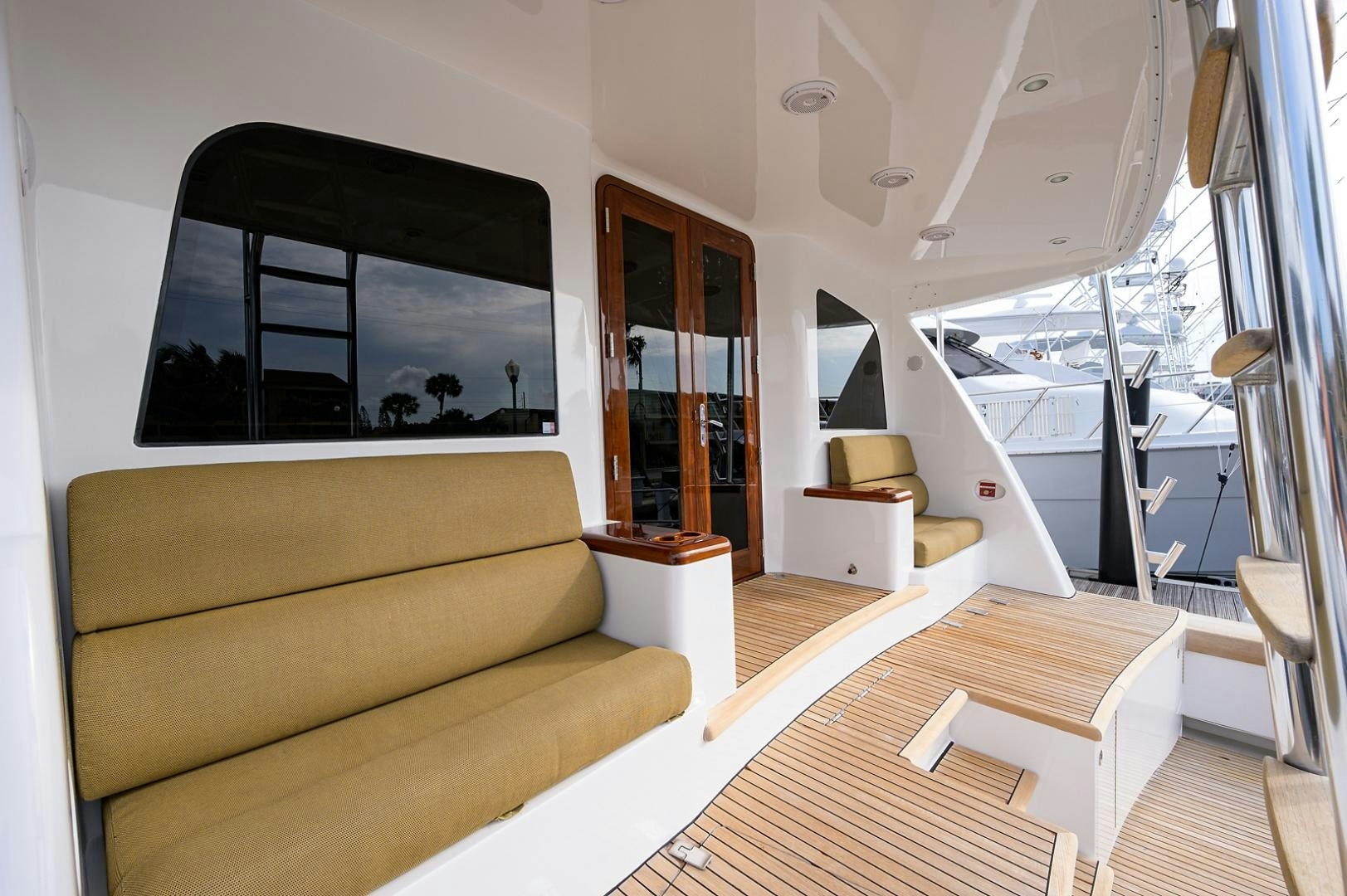 a living room with a couch and a tv aboard BLACK SHADOW Yacht for Sale