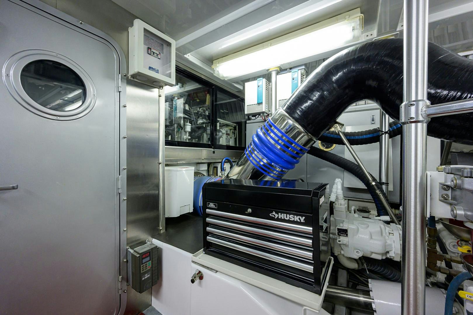 a machine with a blue tool aboard BLACK SHADOW Yacht for Sale