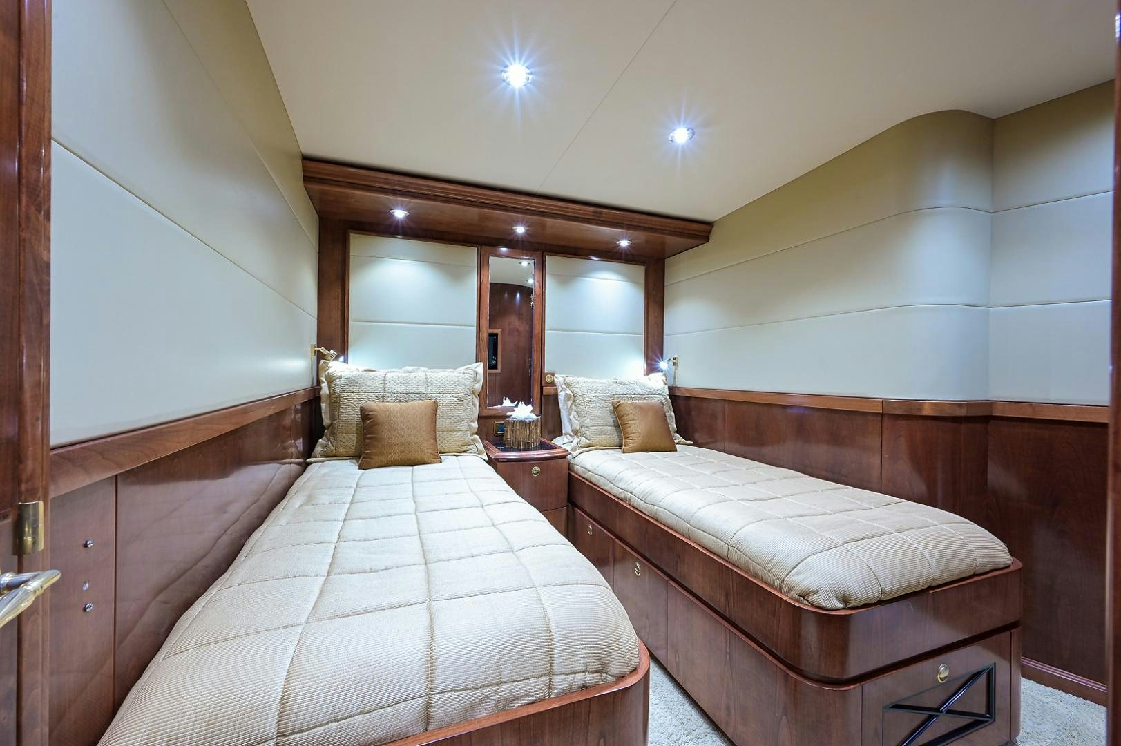 a couple of beds in a room aboard BLACK SHADOW Yacht for Sale
