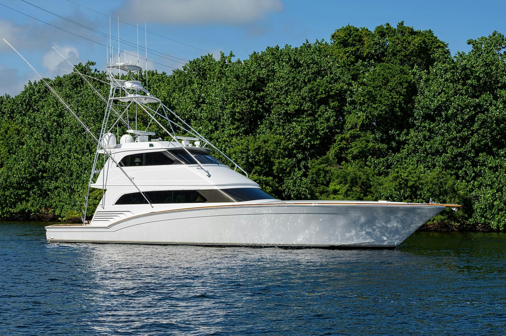 a white boat on the water aboard BLACK SHADOW Yacht for Sale