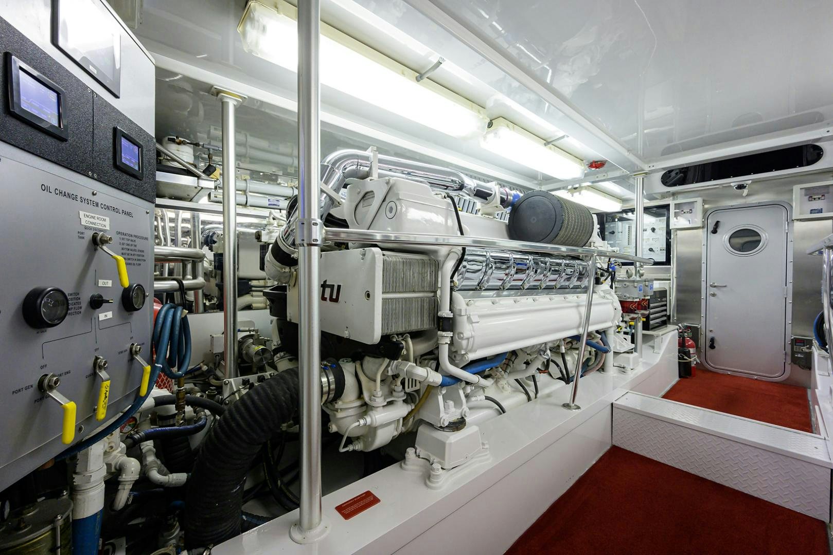 a room with white machines aboard BLACK SHADOW Yacht for Sale