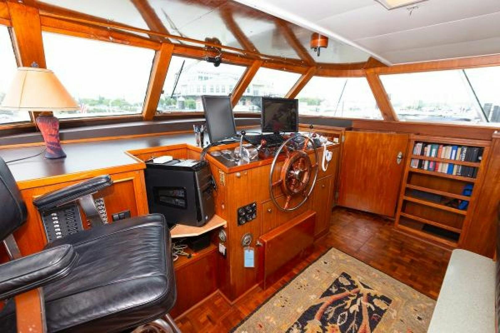 a room with a desk and computer aboard No Name Yacht for Sale