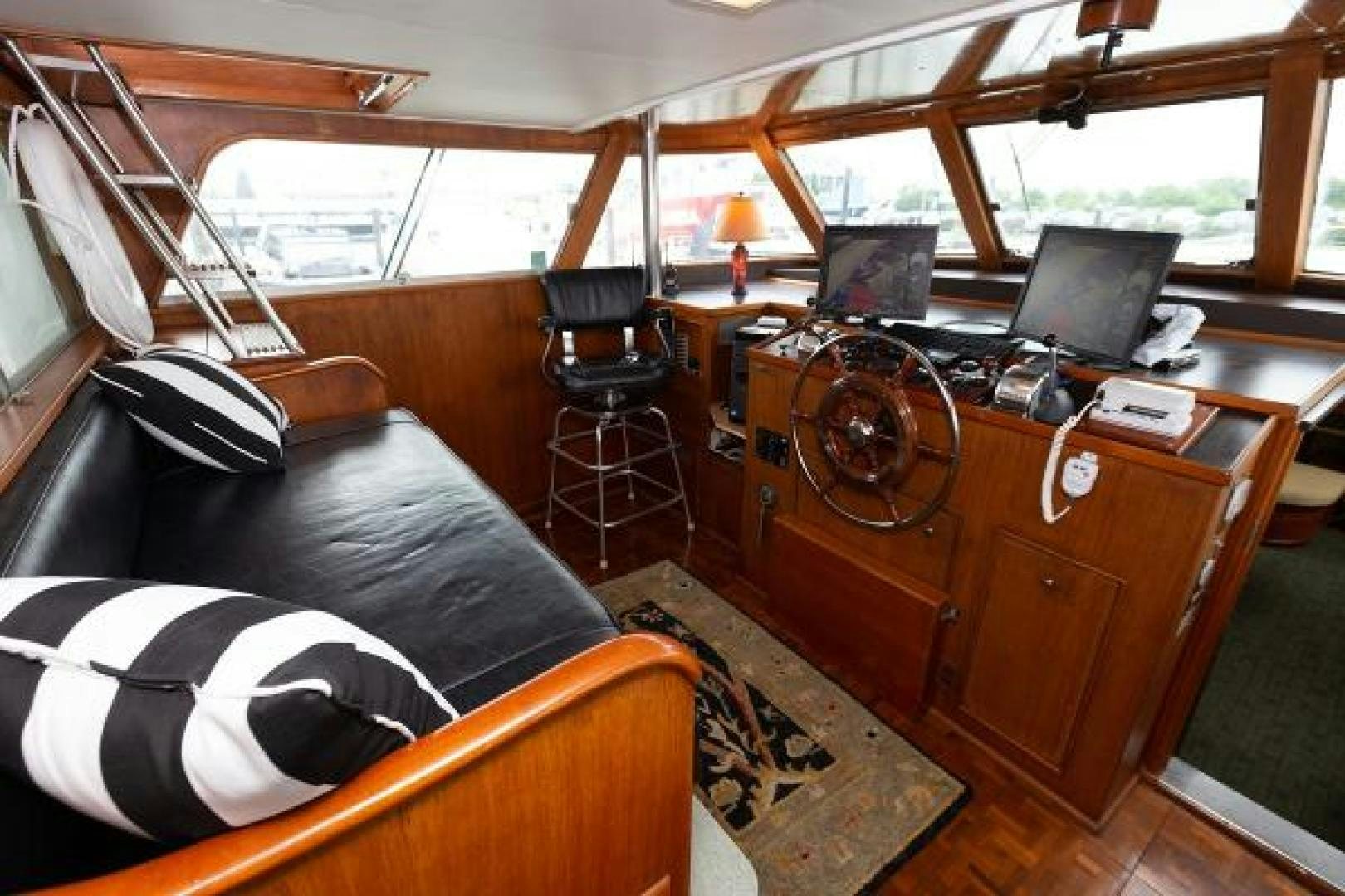 a boat with a desk and a chair aboard No Name Yacht for Sale