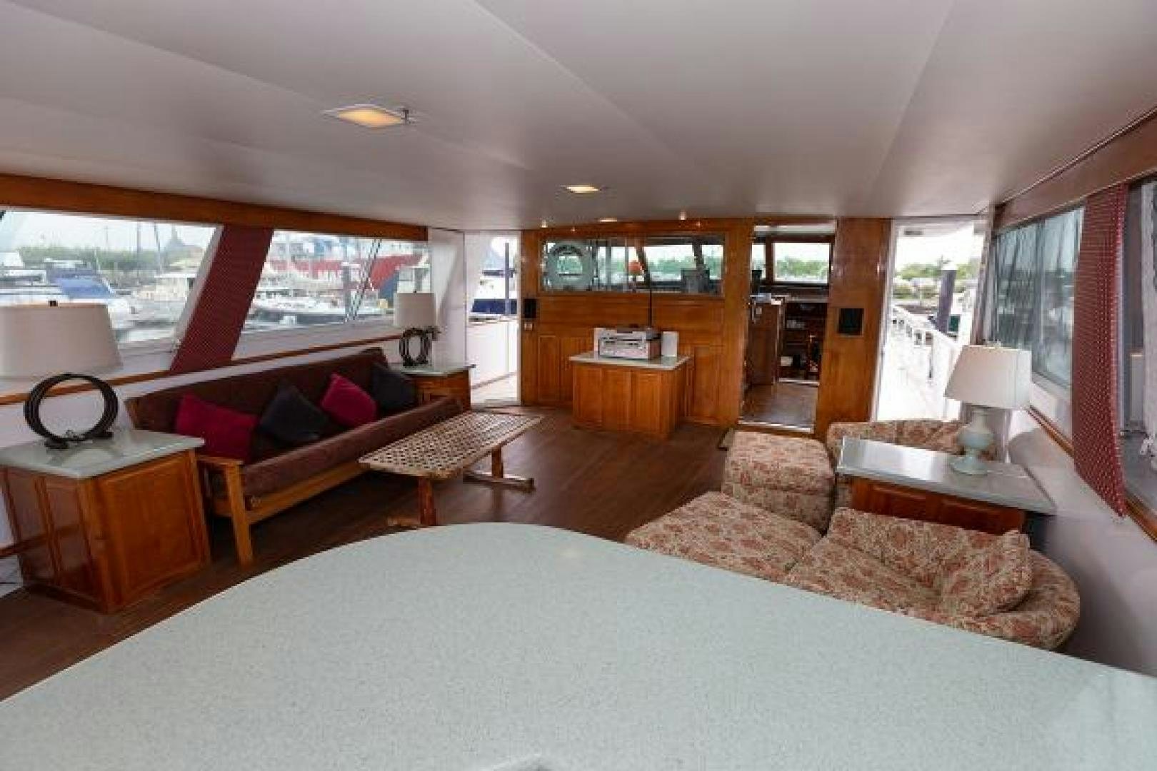 a living room with a large window aboard No Name Yacht for Sale