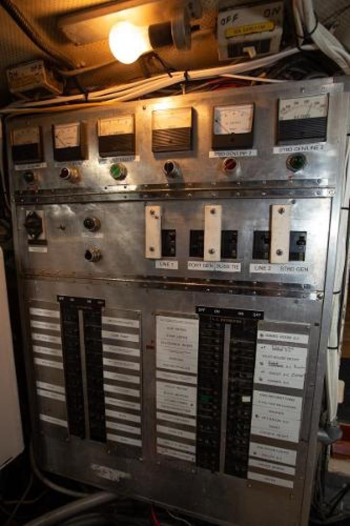 a machine with a piece of paper aboard No Name Yacht for Sale