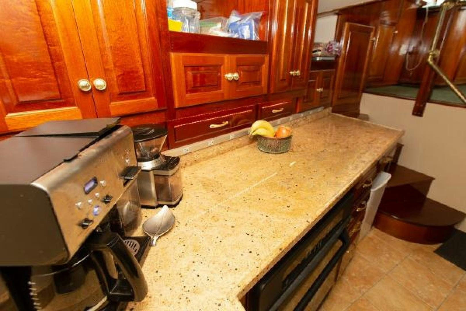 a kitchen with a countertop aboard No Name Yacht for Sale