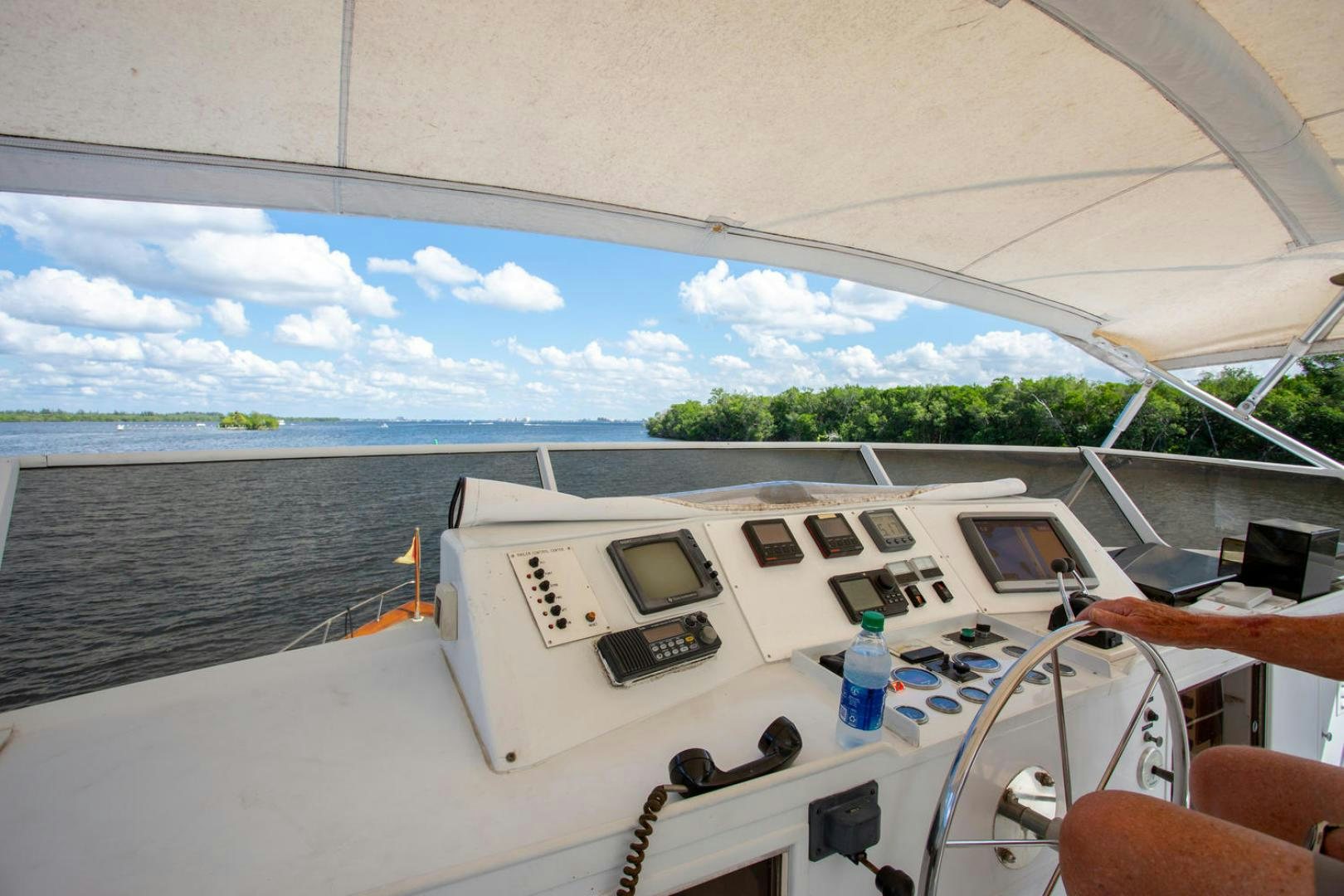 a boat on the water aboard HIGH MILEAGE Yacht for Sale