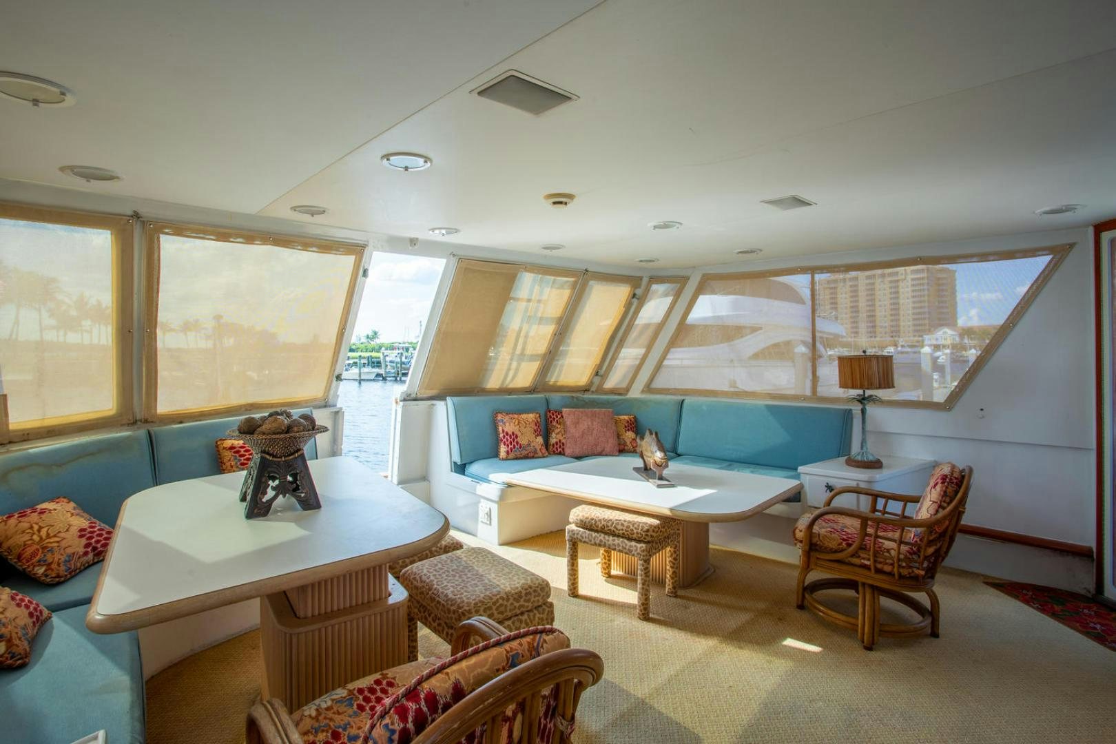 a living room with a couch and a table aboard HIGH MILEAGE Yacht for Sale