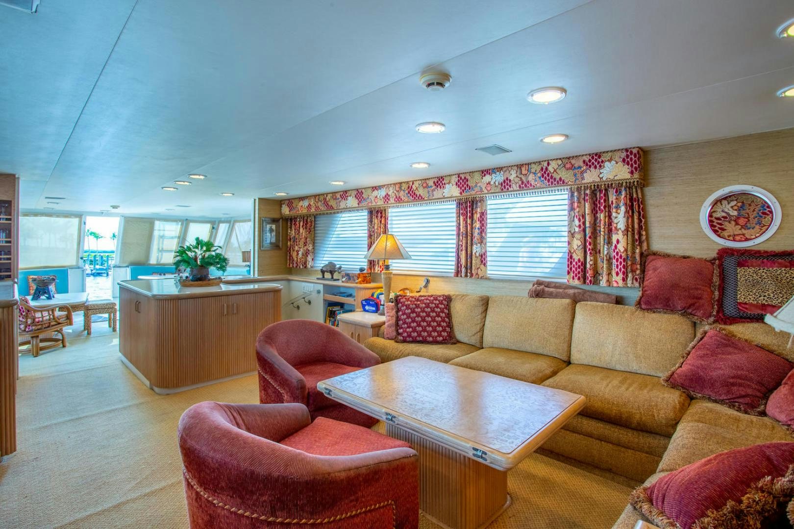 a living room with a couch and a table aboard HIGH MILEAGE Yacht for Sale